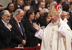 Archbishop Parolin greeting well-wishers at the end of Mass in 2009. Pope Benedict XVI had just ordained him a bishop. (CNS/Paul Haring)