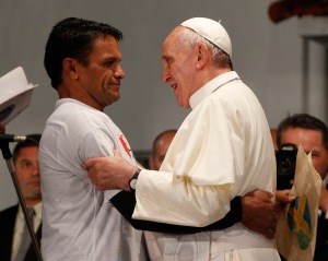 Pope greets man as he meets with patients, others at hospital in Rio