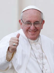 Pope Francis gives thumbs as he leaves St. Peter's Square after celebrating Palm Sunday Mass