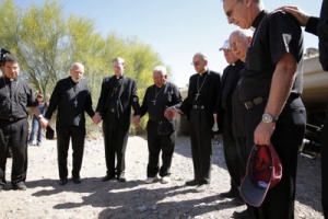 A group of U.S. bishops pray for immigrants at the end of their hike through part of the Sonoran Desert. (CNS photo/Nancy Wiechec) 