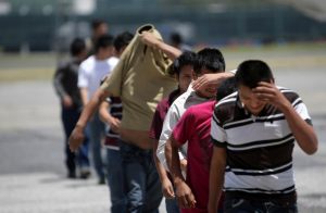 Guatemalan migrants deported from U.S. arrive at airport in Guatemala City. (CNS photo/Reuters)