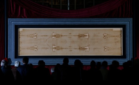 The Shroud of Turin unveiled yesterday for the media. Now on public display, (CNS/Paul Haring)